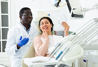 Woman smiling at the dentist