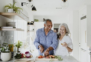 couple cooking in their kitchen 