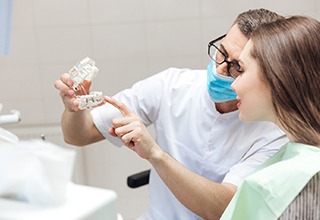 Owasso implant dentist talking with patient 