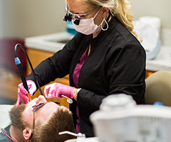 man getting dental checkups