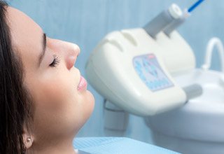 woman relaxing by sedation machine