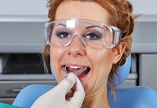 woman getting TMJ treatment