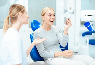 A smiling woman at the dentist’s office