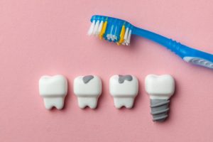 Toothbrush, teeth and dental implant