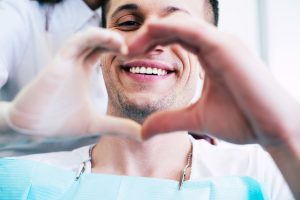 A patient greets their dentist.