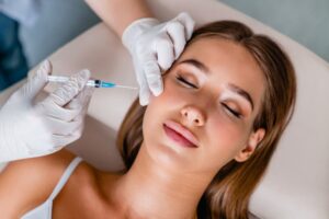 Woman receiving Botox injection. 